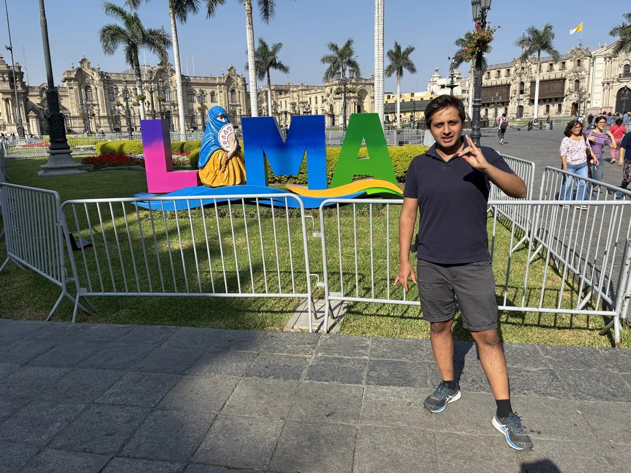 The LIMA letters on the Plaza Mayor, Government Palace behind