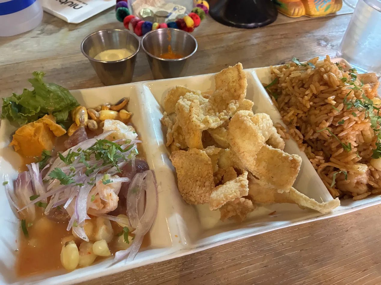 Ceviche with sweet potato, chicharrón and cancha