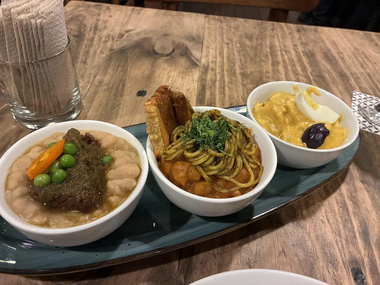 A tasting trio — stew, tallarines and ají de gallina